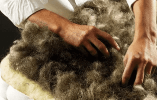 Hands crafting natural fillings by hand