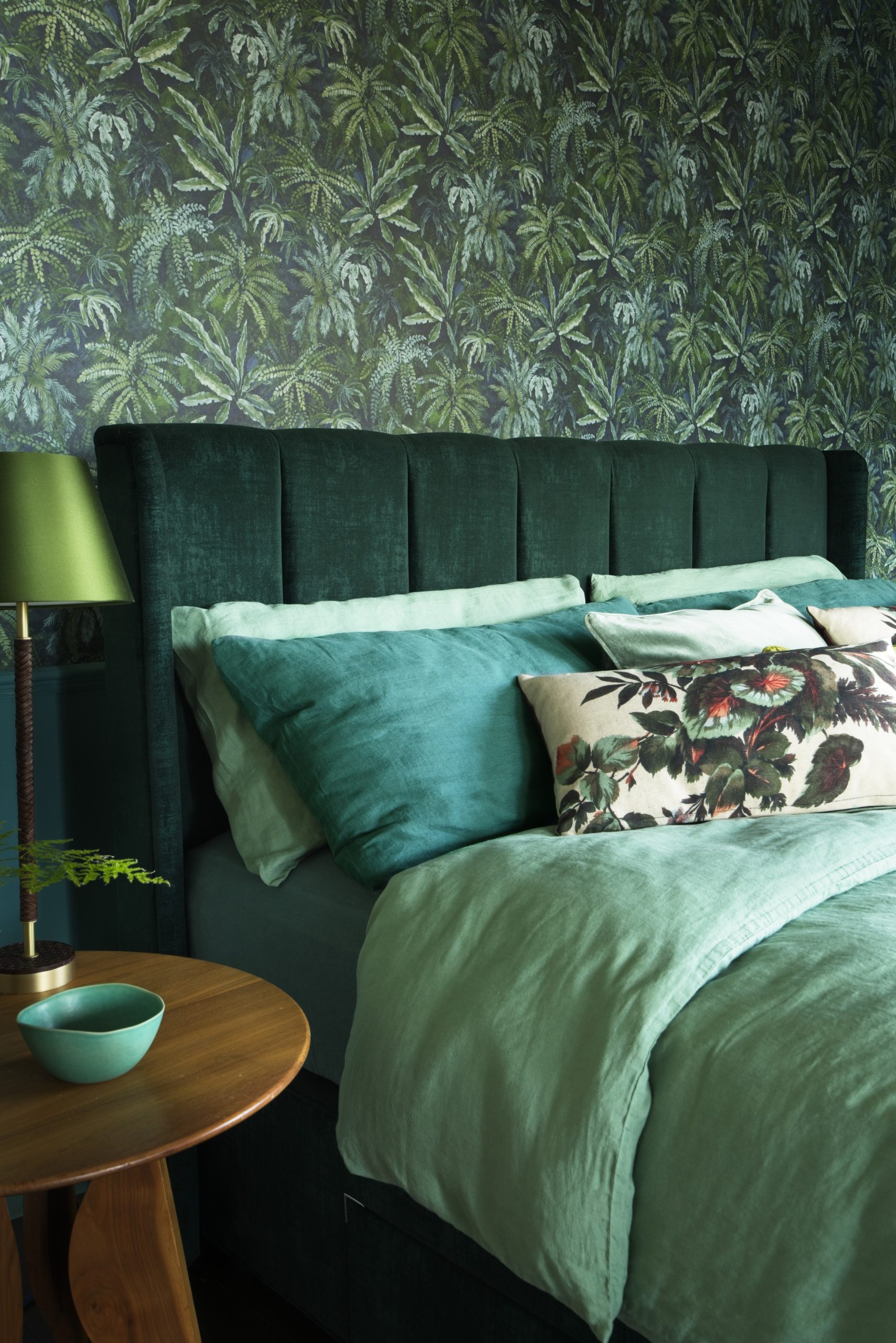 Hypnos Pillow Top Elite styled with headboard in a luxury bedroom setting